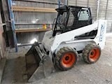 Аренда мини-погрузчика Bobcat 763 с двухчелюстным ковшом